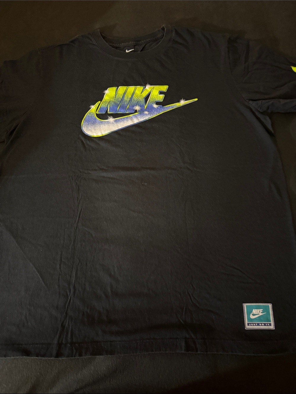 Nike Black Short Sleeve Tee with Blue and Yellow Gradient Logo